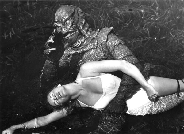 Ginger Stanley in the grip of the creature, Silver Springs, ca. 1955